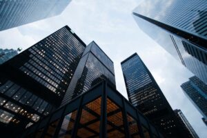 Photo by Sean Pollock low angle photo of city high rise buildings during daytime